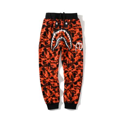 China INS QUICK DRY BAPE warm pants skull orange letter printing camouflage men's thin casual personality loose feet pants for sale