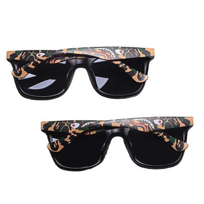 China 2022 fashion BAPE sunglasses hot selling trend retro embossed stereo shark camouflage sunglasses polarized men and women sunglasses for sale