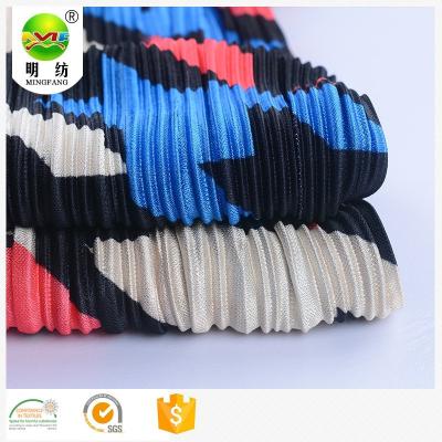 China Wholesale Shiny Polyester African Printed Pleated Knitted Fabric for sale