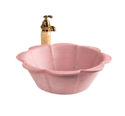 China Wholesale Cheap Modern Design Modern Rose Petal Shape Ceramic Countertop Basin for sale