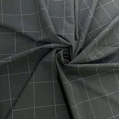 China Tejido texturizado de jacquard a cuadros de cuatro caras 91% de nylon 1% de poliéster 8% de spandex en venta