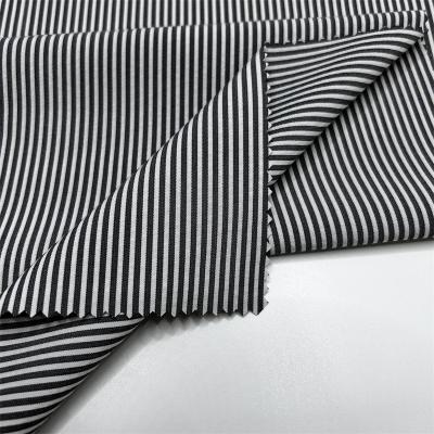 中国 150D Cationic Recycled Polyester Vertical Stripe Fabric Dual Tone Effect In Trousers And Bottoms 販売のため