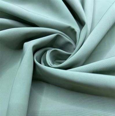 China 150D Recycled Polyester Filament Satin Fabric 150D*150D Jackets And Coats Trench Coats en venta