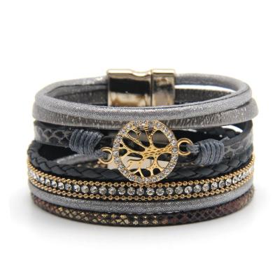 China 2019 Ethnic Tree Leather Hollow Ladies Life Bracelets Rope Patterns Magnetic Explosion Buckle Jewelry for sale