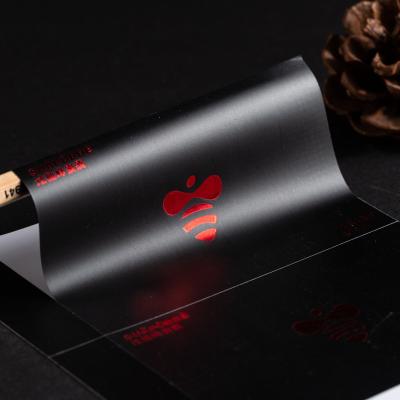 China Brand Logo Print Gold Foil Black Stickers Waterproof Hot Stamping Self Adhesive Customized Printing for sale