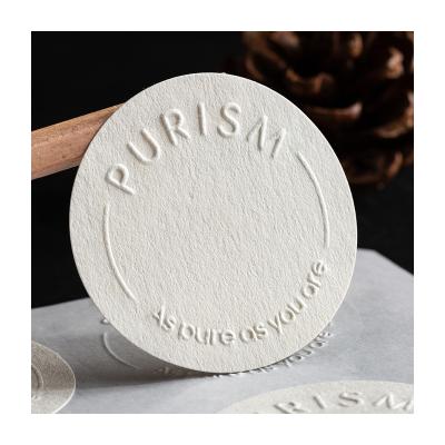 China Waterproof High End White Round Embossed Stickers Customized Bump Gift Logo Jewelry Label Stickers For Packaging for sale