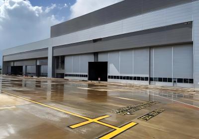 China Hangar de estructura de acero personalizable para soluciones de almacenamiento flexibles y aeronaves en venta