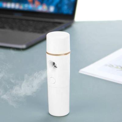 China 2020 15ml Moisturizer Jet Nano Mist Handheld Steamer Nebulizer Facial Humidifier Skin Care Machine Face Steamer for sale