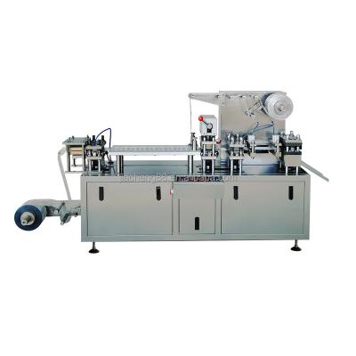 China Hot sale automatic food blister packing machine pill filler tray filling machine for sale