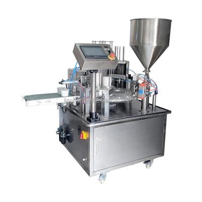 China Good price food powder filling machine liquid paste filling and sealing machine with nozzle filling packaging machine for sale