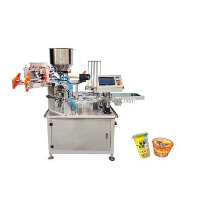 China Automatic Plastic Food Liquid Tray Rotary Sealing Machine Cup Food Yogurt Jelly Filling and Sealing Machine for sale