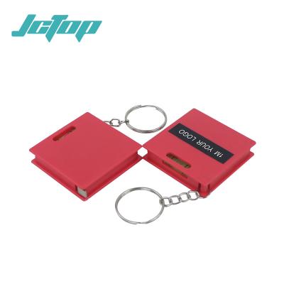 China JCTOP Logo Retractable Tape Keycheain Eco-friendly Custom Measuring Fiberglass 1m Small Tape Measure for sale