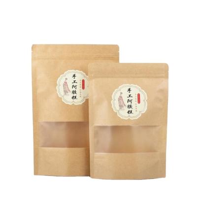 China Free Samples Available Custom Printed Stand Up Moisture Proof Kraft Paper Pouch Bag With Clear Window Kraft Paper Bag Supplier for sale