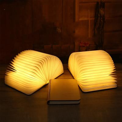 China Modern Wooden Folding Mini Book Shaped Table Lamp USB Led Reading Book Bed Side Table Lamp for sale