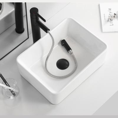 China Modern White Smooth Ceramic Bathroom Basin Faucet Bathroom European Square Style Cabinet Wash Basin for sale