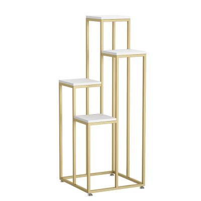 China Shops High End Boutique Mall Window Retail Store Gold Metal Shoes Bag Hat Flower Floor Rack Showcase Display Rack for sale