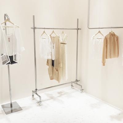 China Clothes Shop Women's Clothing Store High Quality Size Adjustable Heavy Duty Clothes Racks Mobile Clothing Rolling Rack With Wheels for sale