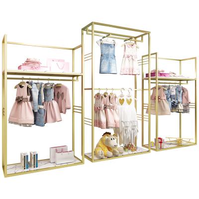 China Clothes shop custom wholesale child clothing rack furniture baby shop interior decoration design metal clothing rack for sale