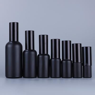 China 5ml 10ml 15ml 20ml 30ml 50ml 100ml cosmetic black spray glass bottle for cosmetic packaging for sale