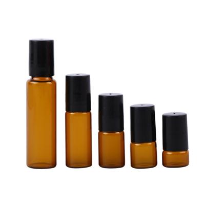 China Wholesale Cosmetic Essential Oil Empty Perfume Bottle Roll Ball Glass Roll On Bottle 10ml With Plastic Cap for sale