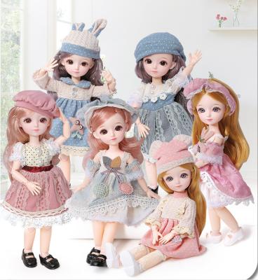 China Changeable Clothing 12 Inch 22 Movable Attaches New BJD Doll 31cm 1/6 Cute Blue Makeup Dress Brown Eyeball Doll With Fashion Dress For Girls Toy for sale