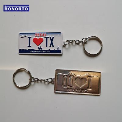 China Custom Tourist Decoration SEDEX Souvenir Embossed Aluminum Key Metal License Plate Chain for sale