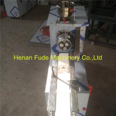 China Automatic pouring oil twist making machine,fried dough twist making machine,Chinese doughnut making machine for sale