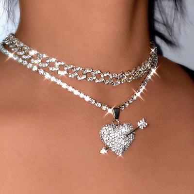 China Trendy Gold Silver Plated Cupid's Arrow Necklace For Women Bling Bling Gifts Iced Out Heart Pendant Necklace for sale