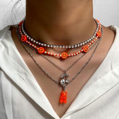 China Trendy Trendy Orange Rice Beads Cherry Pendant Necklace Cute Twist Chain Bear Charm Necklace For Women for sale