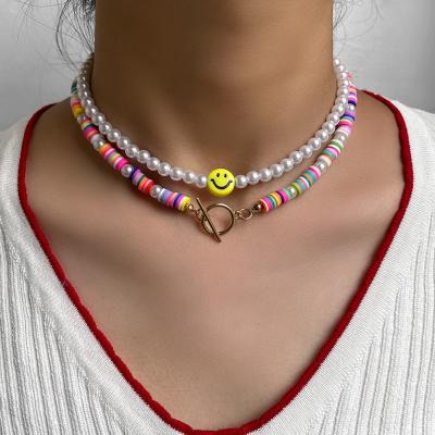 China FASHIONABLE Mixed Imitation Pearl Smile Face Jewelry Clay Beads Necklace For Women Color Beaded Necklace for sale