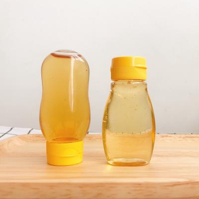 China Powder Honey Bottle Plastic Wholesale PET Vial Plastic Bottles Transparent Refillable Portable for sale