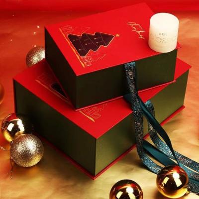 China Papel de Papá Noel Cajas cosméticas impresas a medida Cajas de embalaje de Navidad en venta