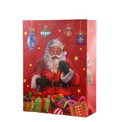 China Gift Xmas Paper Bags With Silk Handle Christmas Paper Gift Bags for sale