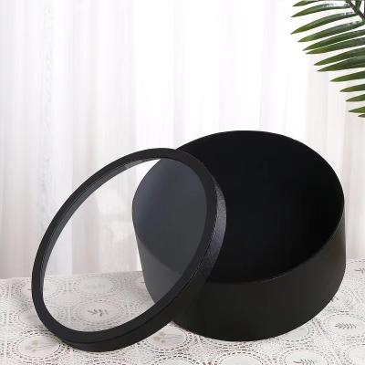 Chine Bouquet noir empaquetant la boîte de fleur cylindrique de PVC d'espace libre de cadeau rond pour des fleurs à vendre