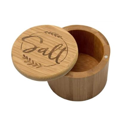 China Sustainable Kitchen Salt Storage Container Round Wooden Salt Box Bamboo Salt Cellar With Lid for sale