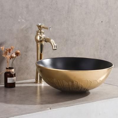 China Luxury Design Round Hand Wash Basin Gold Color WC Matte Black Porcelain Art Basin for sale