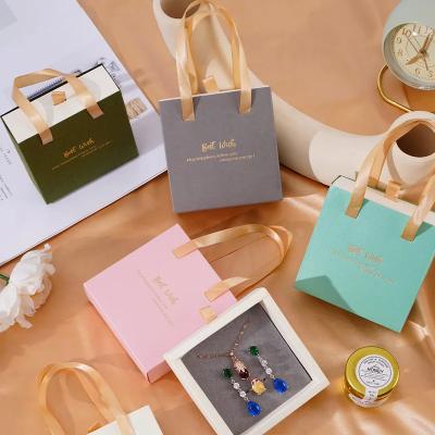 China Luxury Sliding Drawer Gift Paper Jewelry Box And Pouch For Earring Necklace Rings Jewellery Packaging With Foam Insert for sale