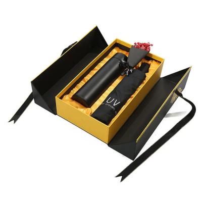 China Creative beautiful European-style luxury gift empty box angel wings black double opening two door gift box for sale