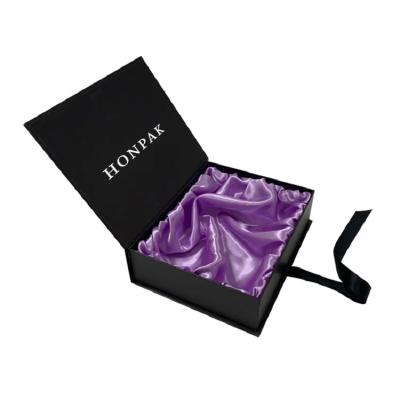 China Custom High-end Folding Romantic Gift Paper Box Luxury Hair Extension Packing Box with Ribbon for sale