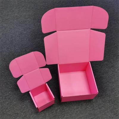 China Precio mayorista OEM envío de correo caja de zapatos cartón de color rosa cartón de embalaje caja de correo para el envío de mercancías en venta