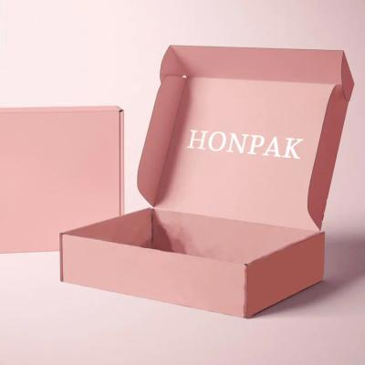 China Custom Logo Private Label Press On Mail Paper Packaging Box Gloss Laminatio Pink Mailing Boxes for sale