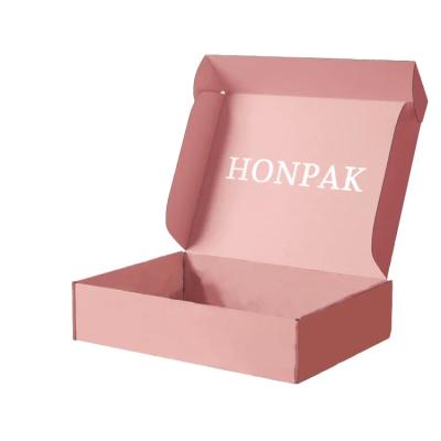 China Cajas rosadas onduladas Impresas personalizadas Encasillado rosado de extremo cosmético Caja de correo en venta