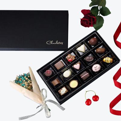 China Custom luxury chocolate boxes packaging paper grids packaging food grade chocolate box for sale