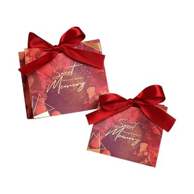 Cina Sacchetto di carta regalo di lusso con arco favore di matrimonio grazie sacchetti regalo di carta kraft in vendita