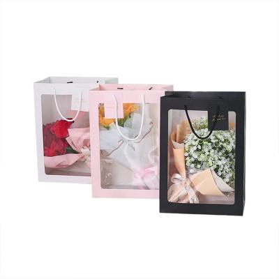 China Transparent Window Rose Bouquet Flower Box Flowers Handbags Gift Paper Bag Flower Carry Bags for sale