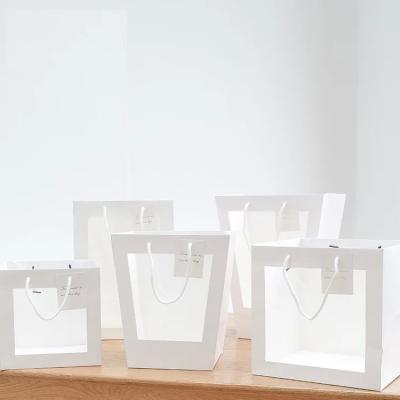 Chine Net vitrine de célébrité sac à main transparent bouquet boutique de fleurs emballage sac cadeau anniversaire sac en papier vitrine ouverte à vendre