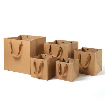 China Custom Print Famous Brand Emballage Packaging Favor Fancy Square Bottom Flower Heavy Duty Kraft Gift Paper Bags for sale