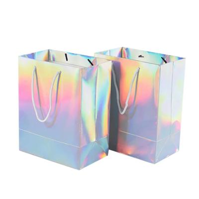 China Custom your own logo printing private label beautiful cosmetic carry shopping holographic gift paper bag for sale