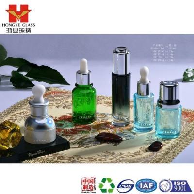 China Personal Care Essential Oil Set Empty Cosmetic Packaging Glass Bottle Dropper Cap White/Green/Black Color HY1352 for sale