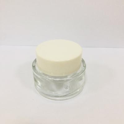 China Personal Care OEM Customization Personal Skin Care Stylish Logo Printing Round Cream Glass Jar 50ml for sale